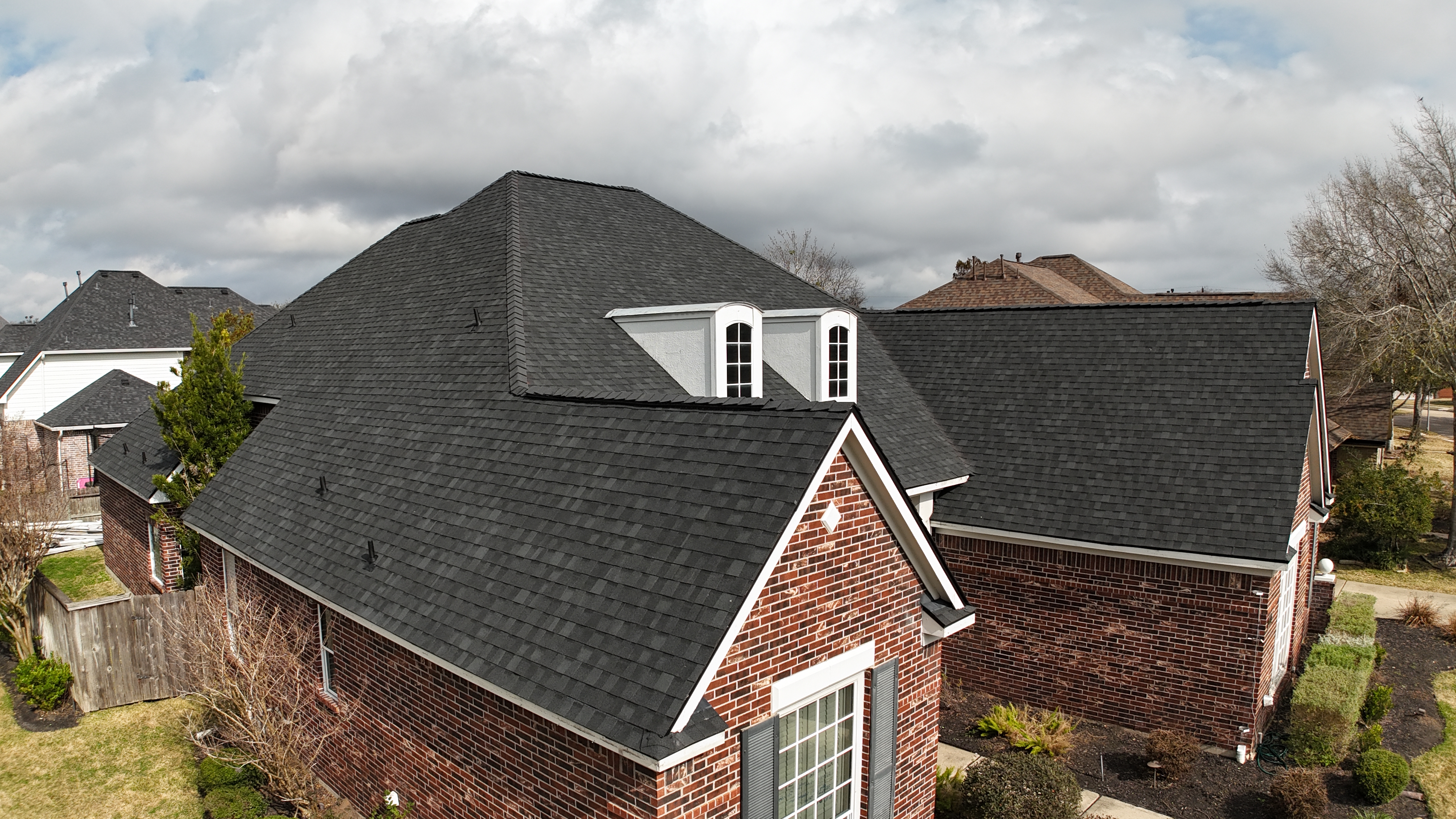 Aerial view of a new architectural shingle roof in Texas